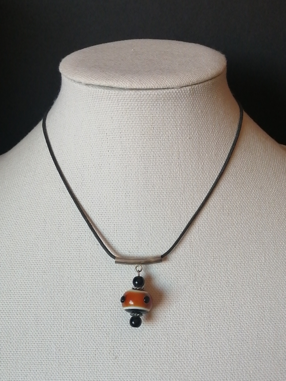 Artisan Lampwork Glass Orange Black Bead Pendant on Black Cord